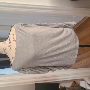 A shimmery silver Sweater wirh ruched sleeves